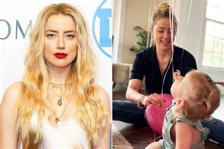 Amber Heard Cradles Newborn Daughter In Sweet Video After Surprise Baby Announcement