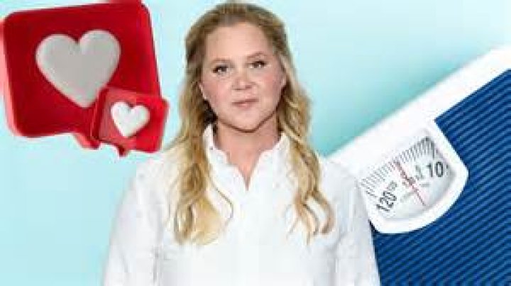 Amy Schumer Shows Off Huge Bare Baby Bump & Jokes That She’s Been Pregnant ‘A Long Time’