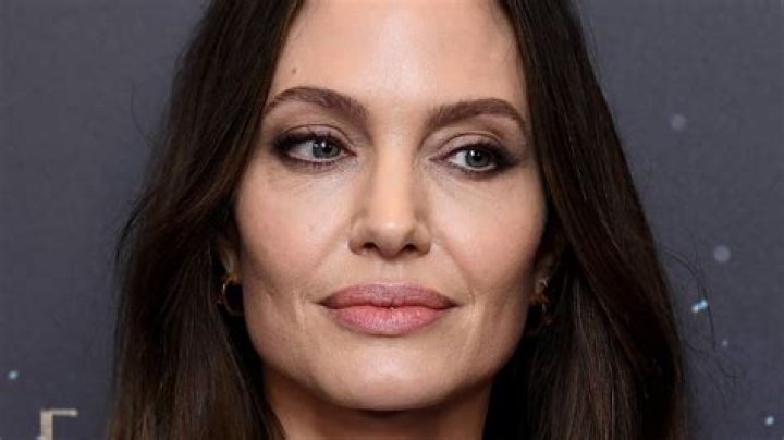 Angelina Jolie Rocks Bangs & Wields An Axe In 1st ‘Those Who Wish Me Dead’ Photos