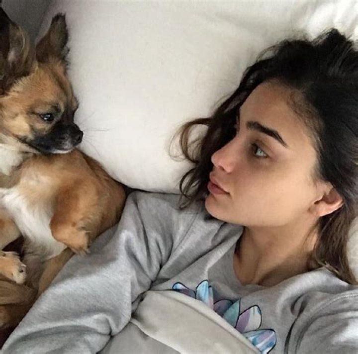 Ariel Winter Puts Her Legs On Display In Just An Oversized Sweatshirt While Posing With Her Cute Dog