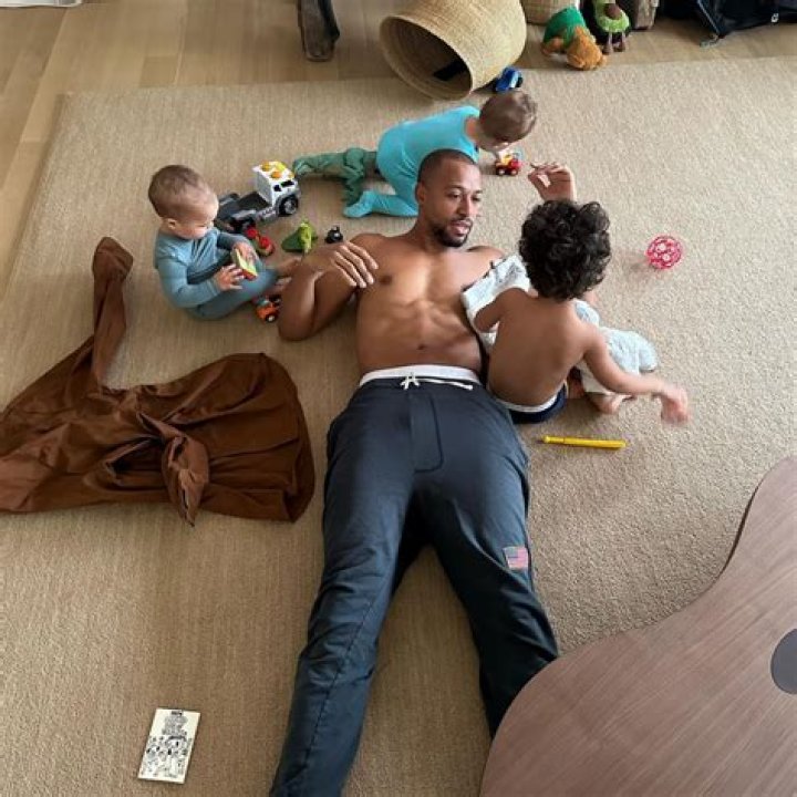 Ashley Graham’s Husband Cradles Her Bare Baby Bump In Stunning ‘Vogue’ Photo Shoot — Pic