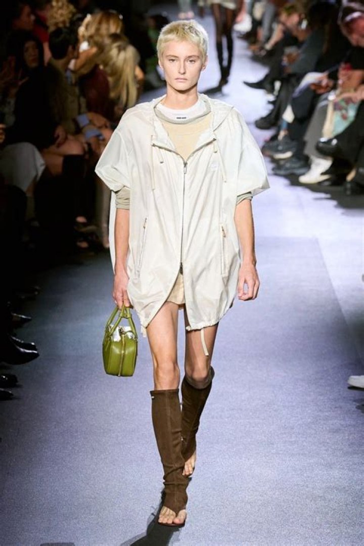 Bella Hadid Rocks Extremely Tiny Crop Top & Bleached Eyebrows on Miu Miu Runway At PFW: Photos