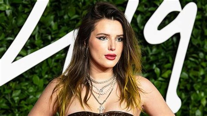 Bella Thorne Wears Black Lingerie & Fur Coat In Snow Pics – Hollywood Life