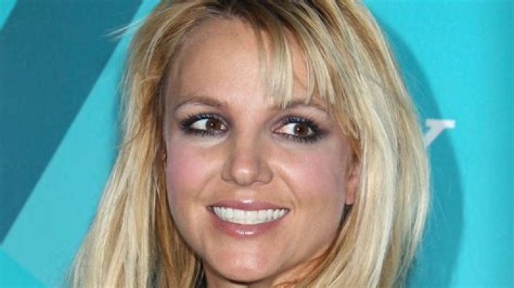 Britney Spears Is All Smiles While Posing Naked in Bed in New Video – Hollywood Life