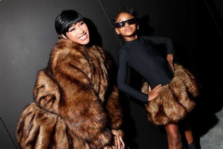 Cardi B & Daughter Kulture, 3, Rock Matching Chanel Ear Muffs While Posing On A Maybach — Photos