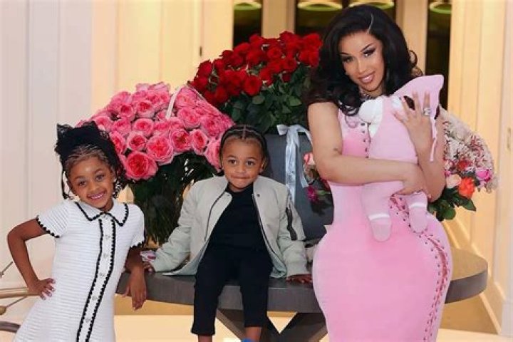 Cardi B’s Daughter Kulture, 2, Models Corn Rows & A $2,140 Louis Vuitton Backpack — See Pics