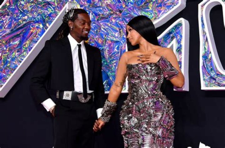 Cardi B Sizzles In A Plunging Color-Block Dress With Offset At The Super Bowl