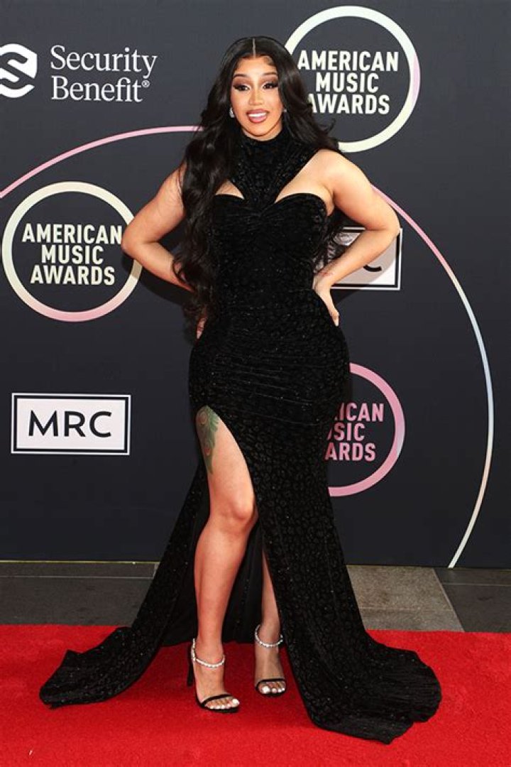 Cardi B Stuns In Black High-Slit Dress For Red Carpet Rollout Ahead Of AMAs