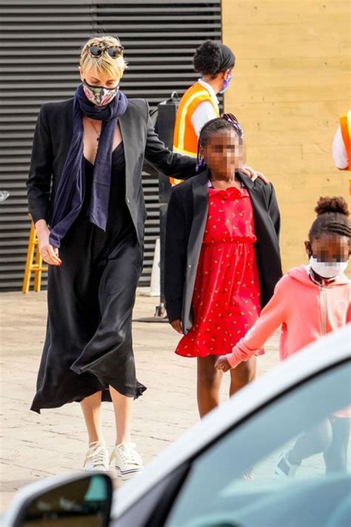 Charlize Theron Confesses Her ‘Heart Belongs’ To Adorable Daughters Jackson, 8 & August, 3 – See Pic