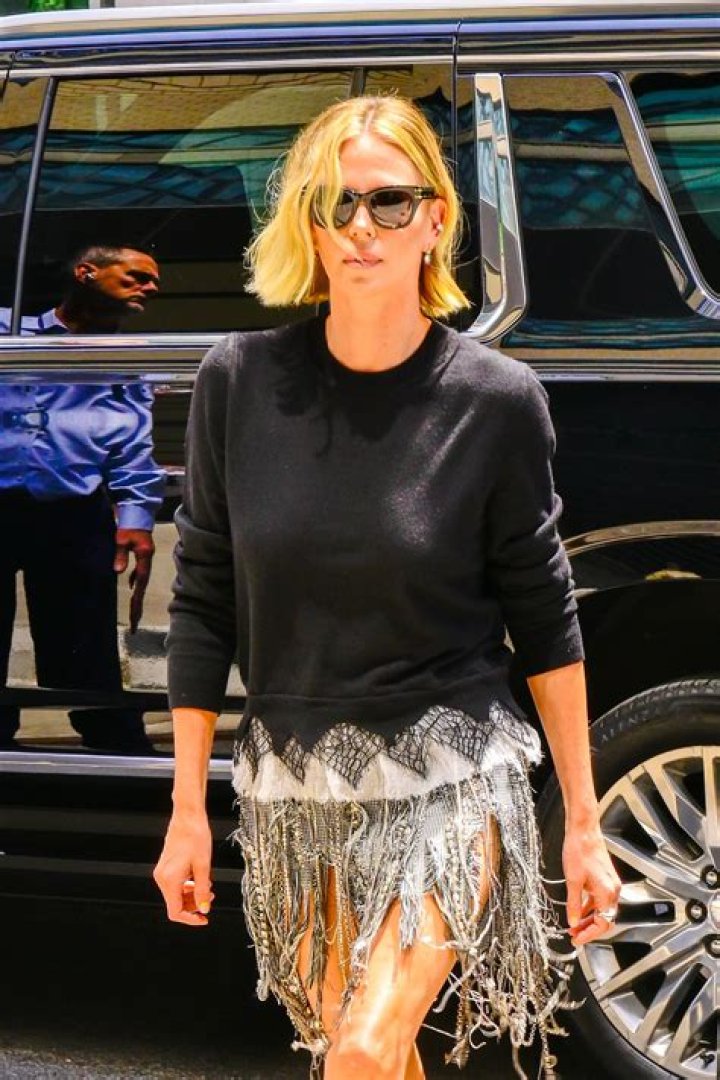 Charlize Theron In Mini Dress At Santa Barbara Film Fest – Photos – Hollywood Life
