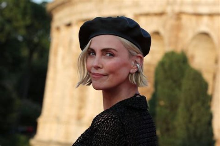 Charlize Theron Rocks Black Bikini On Yacht During Greece Vacation – Hollywood Life