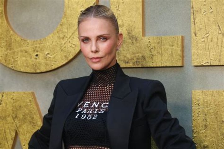 Charlize Theron Rocks Black Swimsuit In Greece On 46th Birthday: Pics – Hollywood Life