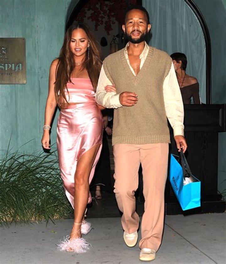 Chrissy Teigen Channels Barbie In Pink Dress With Slit For Date Night With John Legend: Photos