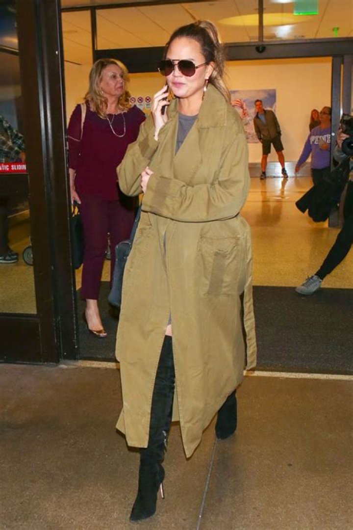 Chrissy Teigen Hiding Her Bump In Fabulous Outfits — PICS