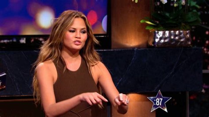 Chrissy Teigen Rocks Lingerie & A Blazer In Sexy Mirror Selfies At Dinner: Photo