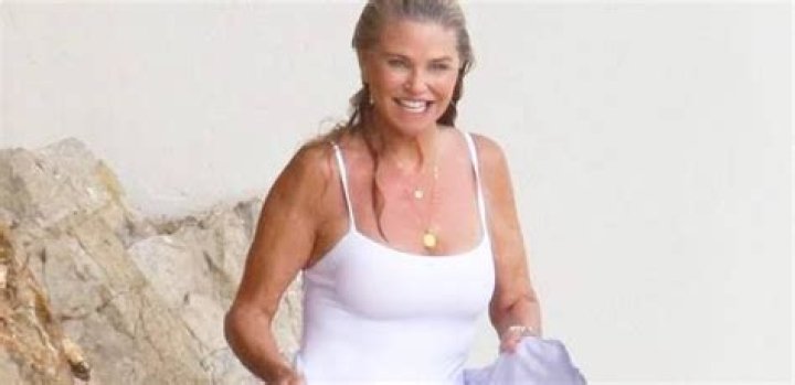 Christie Brinkley, 65, Looks Half Her Age In Magenta Swimsuit On Beach Vacation 