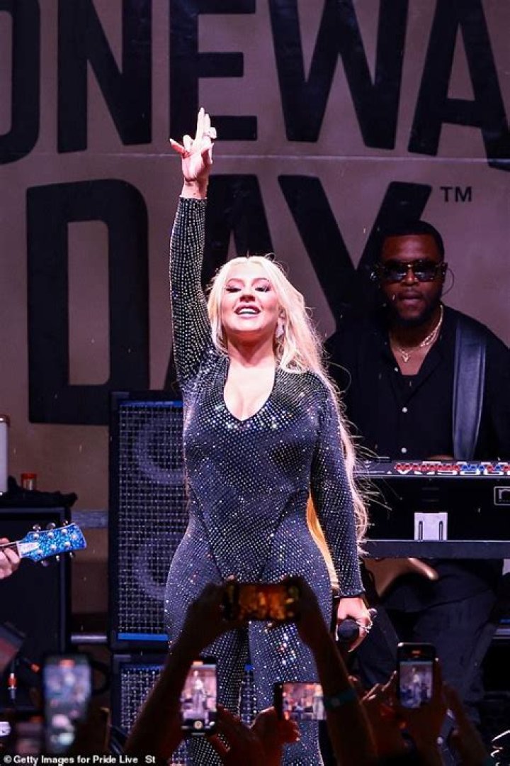 Christina Aguilera Performs In Plunging Top At Latin Recording Academy Event — Photos