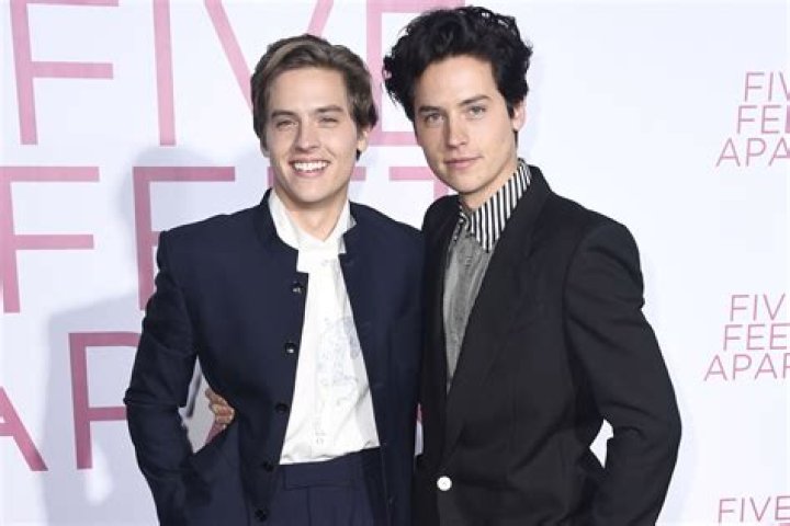 Cole Sprouse & Lili Reinhart Tease They’re Back Together With Cryptic Messages & Sexy ‘W’ Magazine Spread