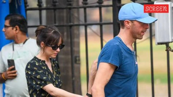 Dakota Johnson Reveals Why She & Chris Martin Keep Their Relationship Out Of The Public Eye