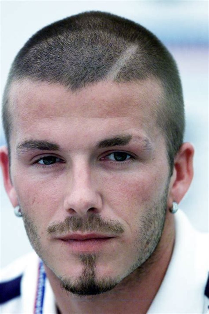 David Beckham’s Son Romeo Rocks Shaved Eyebrows & Head Like Dad: Photo – Hollywood Life