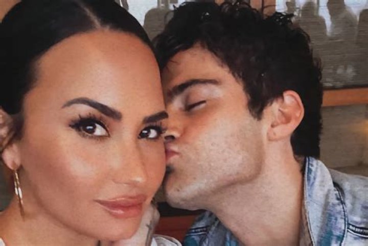 Demi Lovato & Max Ehrich Go In For A Passionate Kiss During Her ‘Favorite Pic’ Of Them Together