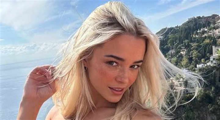 Dua Lipa Does A Headstand As She Shows Off Impressive Yoga Skills In Crop Top & Leggings