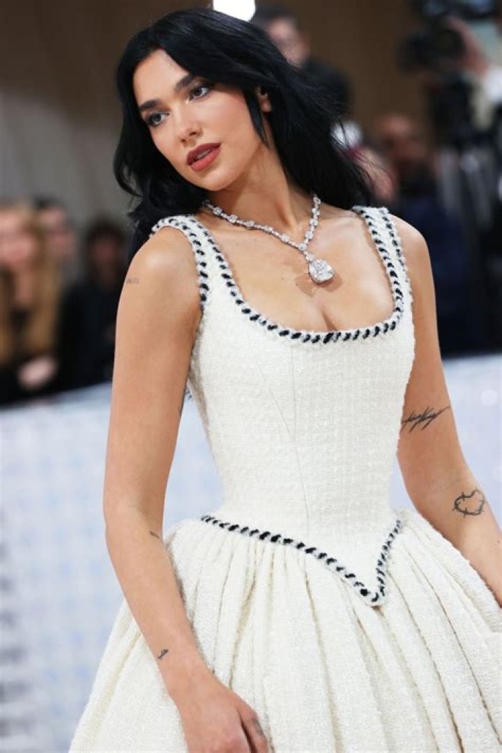 Dua Lipa Wears Silky White Pajamas To Perform New Single On ‘Ellen’ — Watch