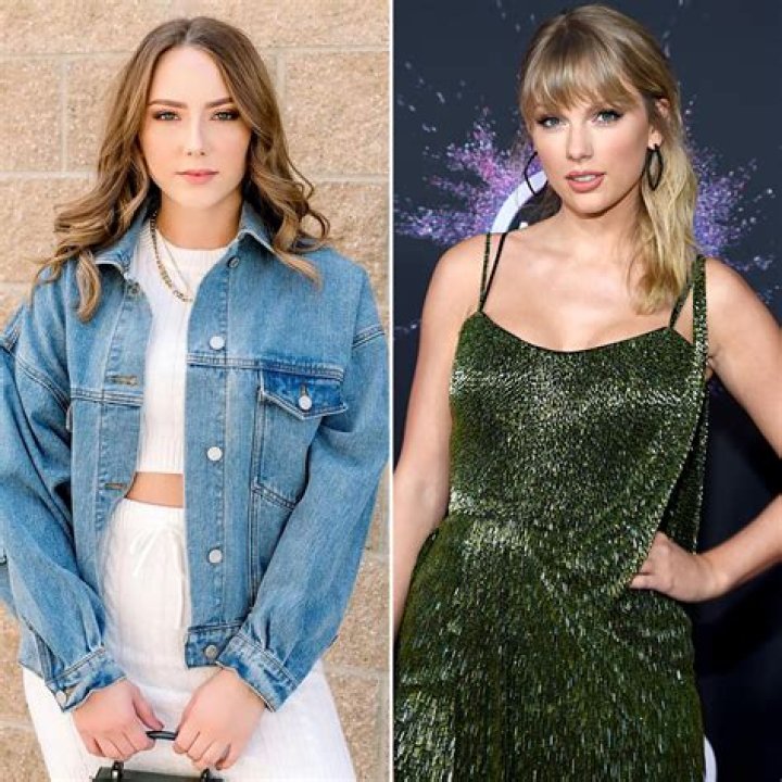 Eminem’s Daughter Hailie Jade, 25, Sips Cocktails In A White Crop Top & Jeans — See Pics