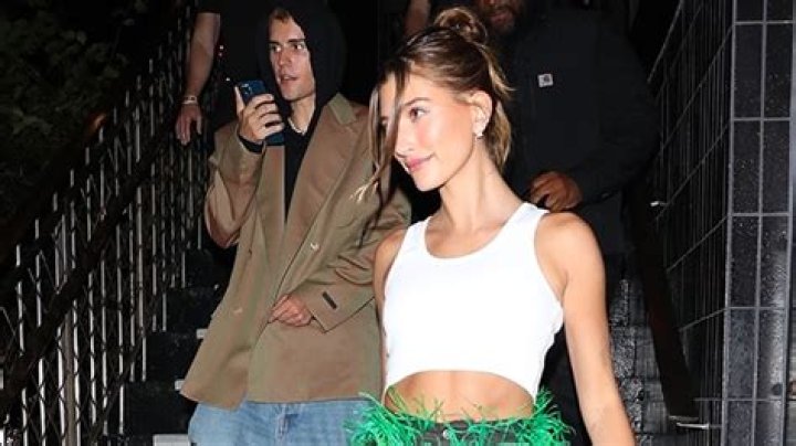 Hailey Baldwin’s Green Feather Pants Outfit – Photos – Hollywood Life