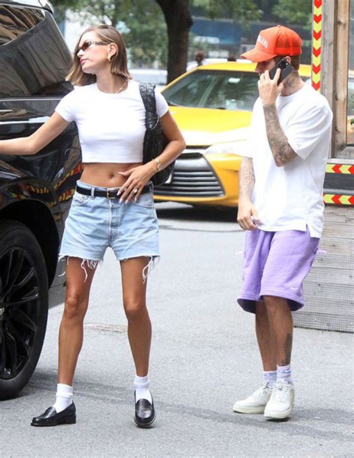 Hailey Bieber Sports Daisy Dukes With White Socks & Loafers, Out With Hubby Justin Bieber In NYC: Photos