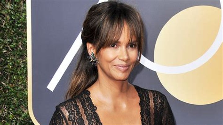 Halle Berry Emerges From The Ocean In Sexy Black Bondage Bikini In Fitness Video