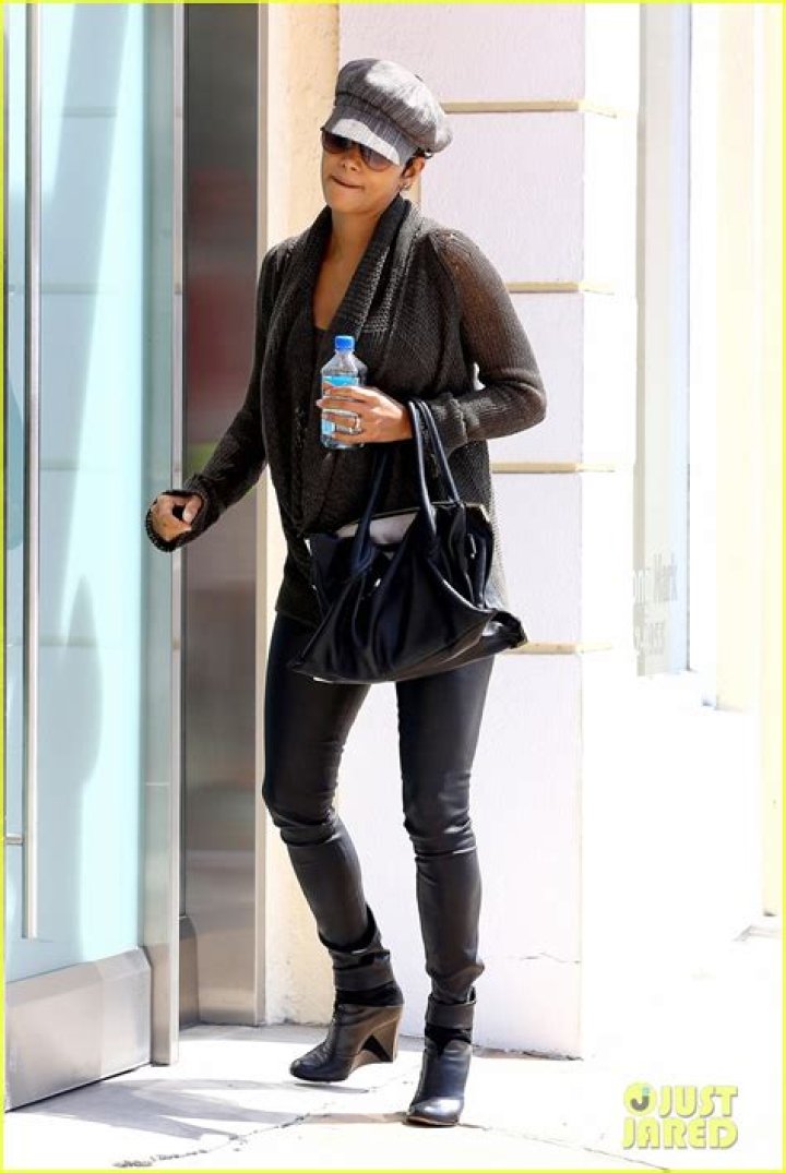 Halle Berry Rocks Cut-Off T-Shirt & Bikini Bottoms While Skateboarding Through The Streets