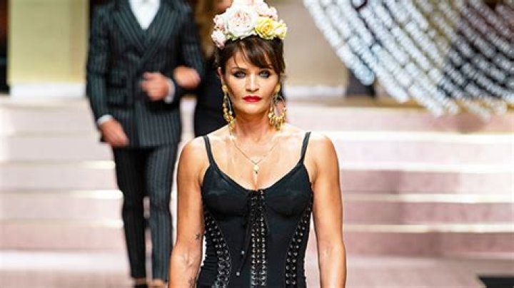 Helena Christensen, 53, Stuns In A Black Bikini While Poolside With Her Dog: Photos