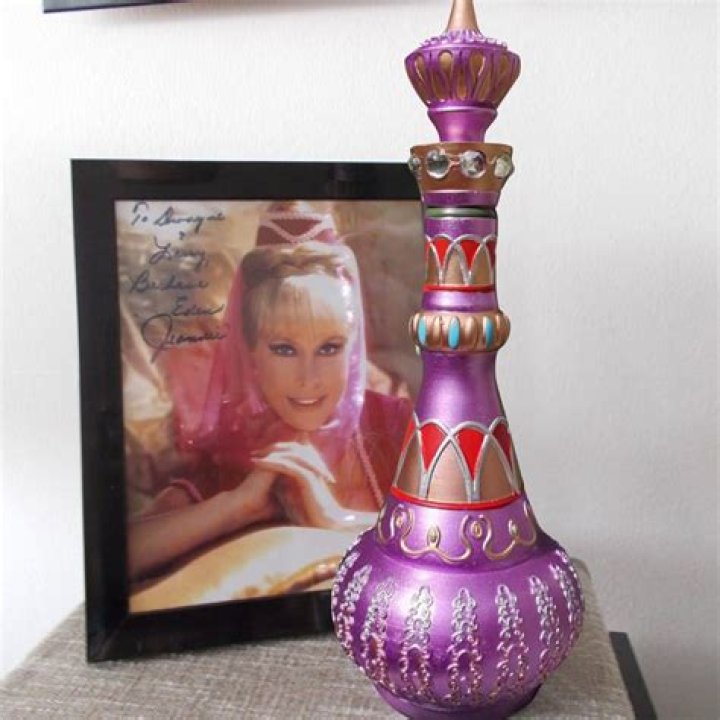 Iggy Azalea Channels ‘I Dream Of Jeannie’ With Purple Crop Top & Matching Skirt — See Pic