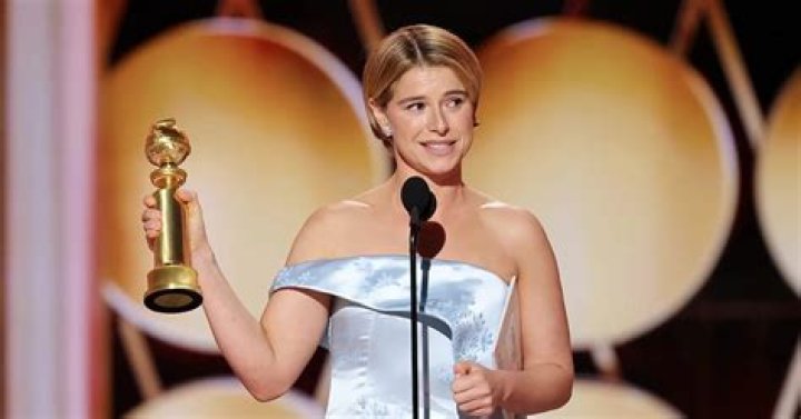 Jennifer Aniston’s Oscar Dress: Flaunts Cleavage In Plunging Slit Gown