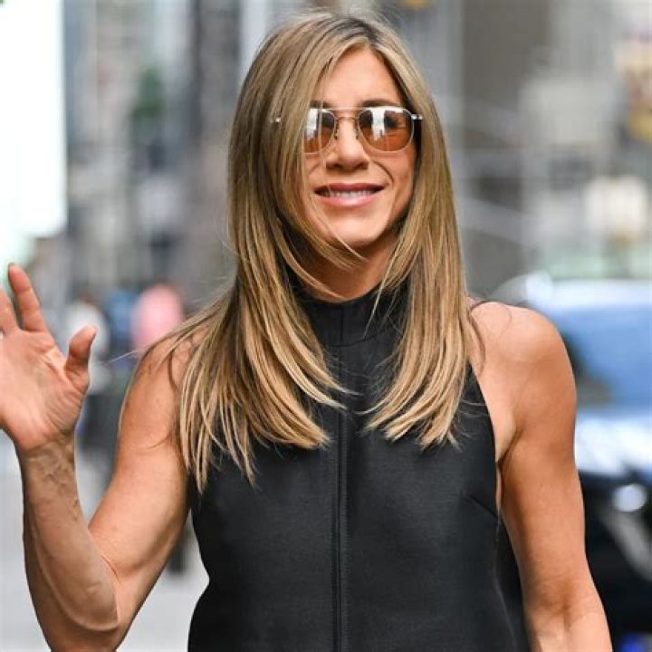 Jennifer Aniston Wears Black Bikini Top & Tiny Shorts In Photo Shoot – Hollywood Life
