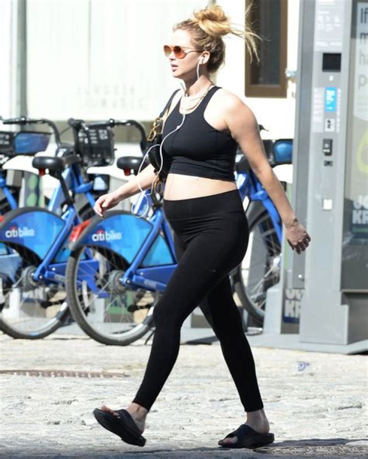 Jennifer Lawrence Shows Off Growing Baby Bump In Black Crop Top — Photos