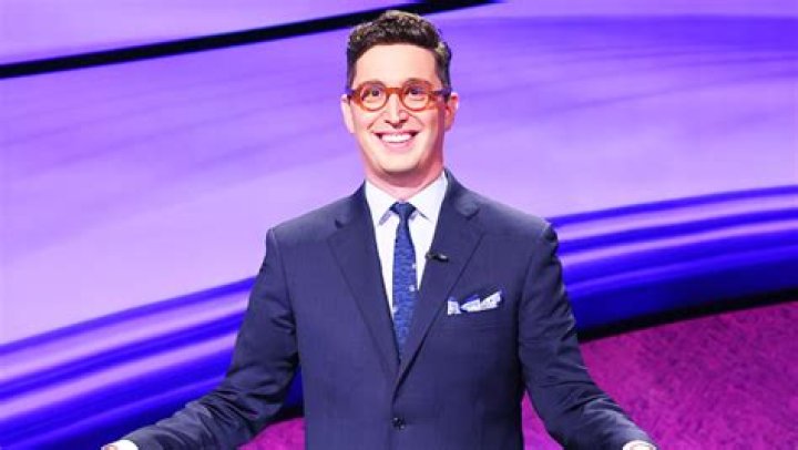 ‘Jeopardy’ Fan Favorite Buzzy Cohen On Honoring Alex Trebek As A Host & If Fans Should Pick His Successor