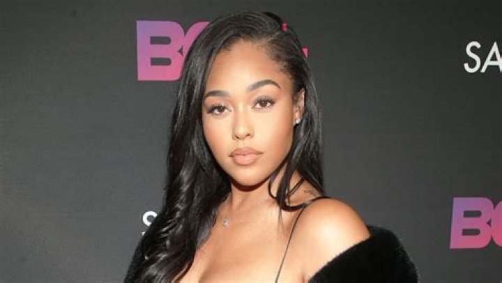 Jordyn Woods Still Stuck In UAE & Making The Most Of It In Sexy Dress Poolside — Pics