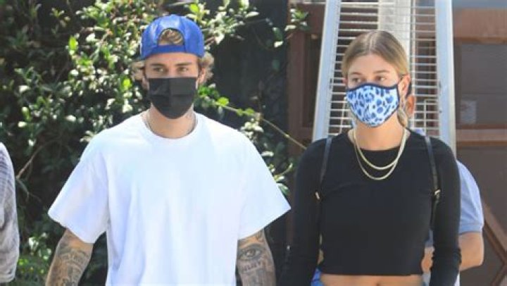 Justin Bieber Cuddles Bikini-Clad Hailey Baldwin In Lakeside Throwback Pic As He Teases New Music