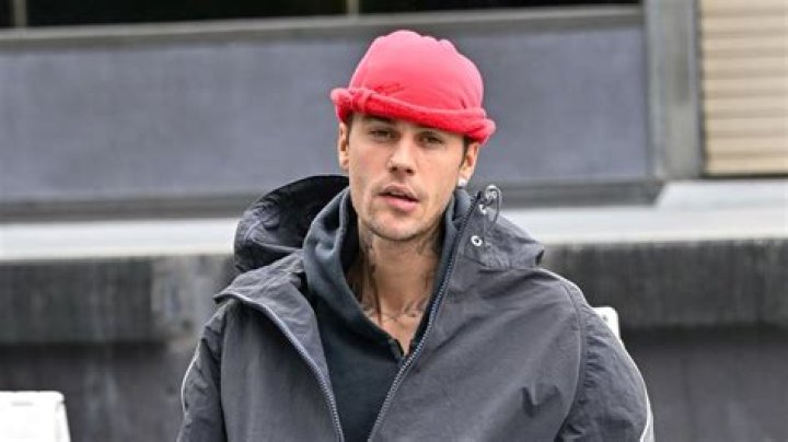 Justin Bieber Takes Shots & Flirts With Bartender While Shirtless In A Bar — See Wild Pics