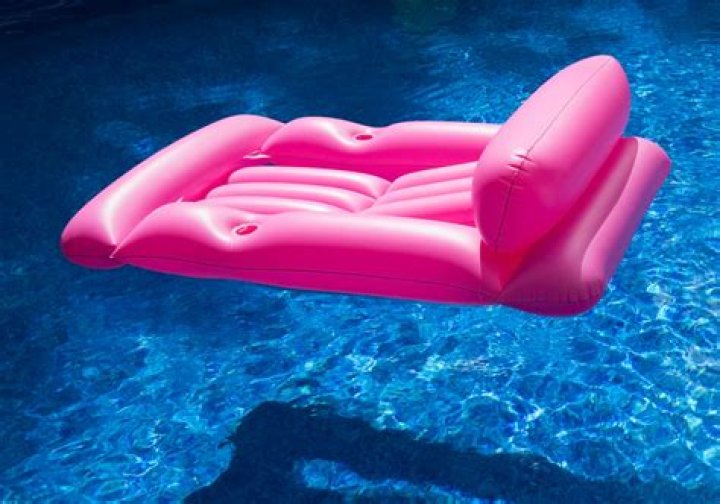 Kate Beckinsale Rocks Pink Bandeau Bikini As She Lounges On A Pool Float With Her Cat