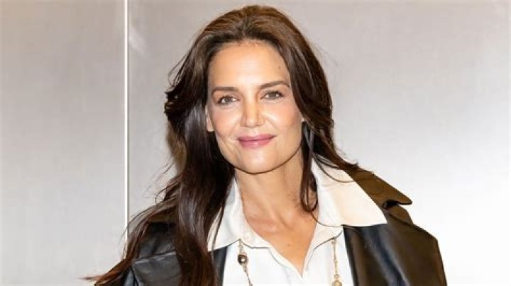 Katie Holmes Looks Ethereal In White Dress While Visiting The Lion King & Jungle Festival In Paris