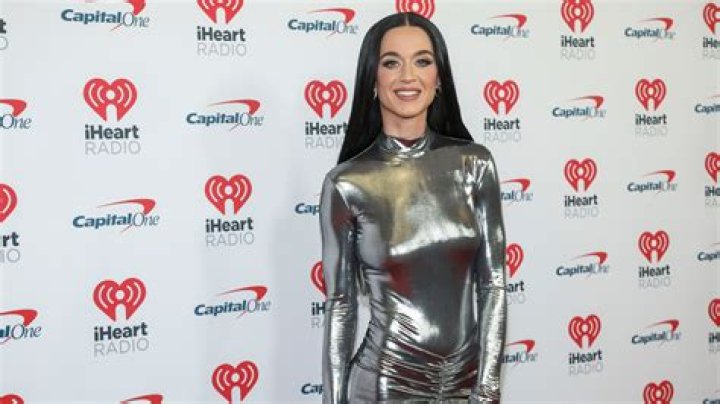 Katy Perry Cradles Her Growing Baby Bump In Stunning Silver Dress — Pics