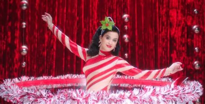Katy Perry Gets Holly & Jolly While Stripping Down For A Massage in ‘Cozy Little Christmas’ Video