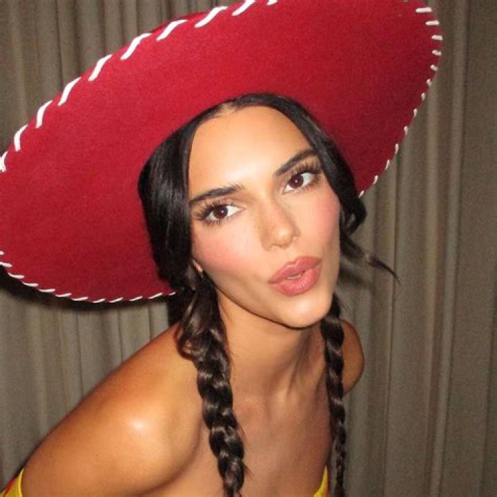 Kendall Jenner Channels Her Cowgirl Side In A Multi-Colored Bikini & Felt Hat 