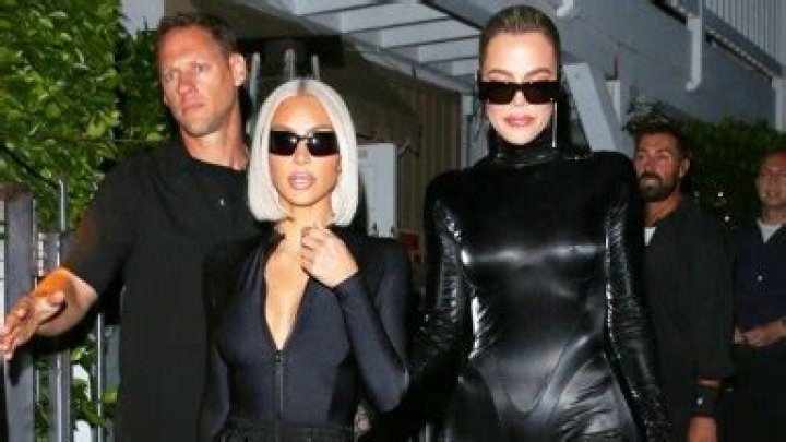 Khloe Kardashian Slays In Skintight Latex Jumpsuit After Tristan Holds Hands With Mystery Woman