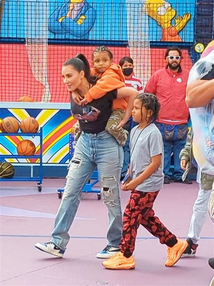 Kim Kardashian Carries Son Psalm West At Universal Studios: Photo – Hollywood Life
