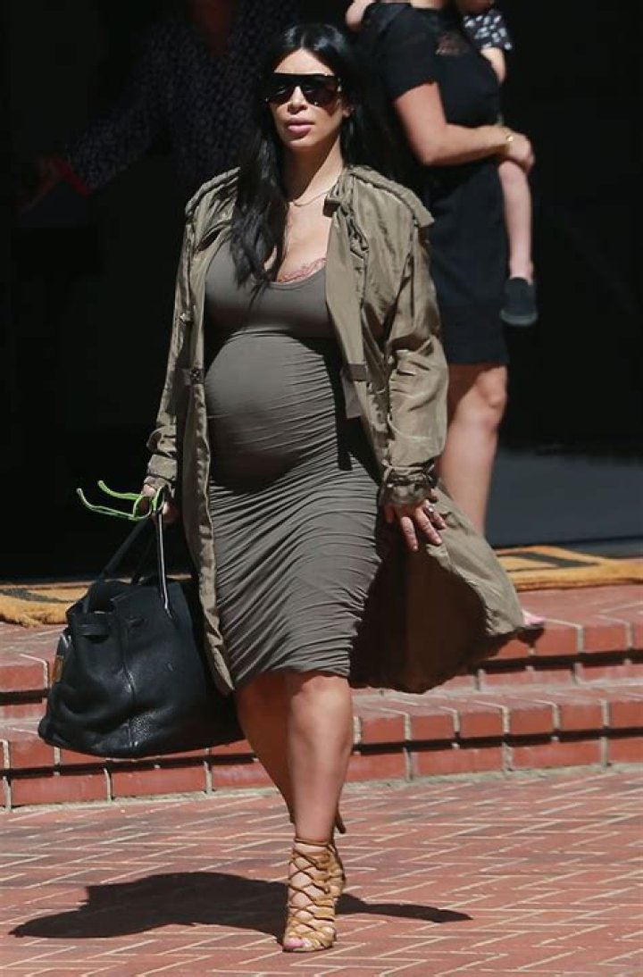 Kim Kardashian Flaunts Big Baby Bump & Bra In Sheer Top — Pic