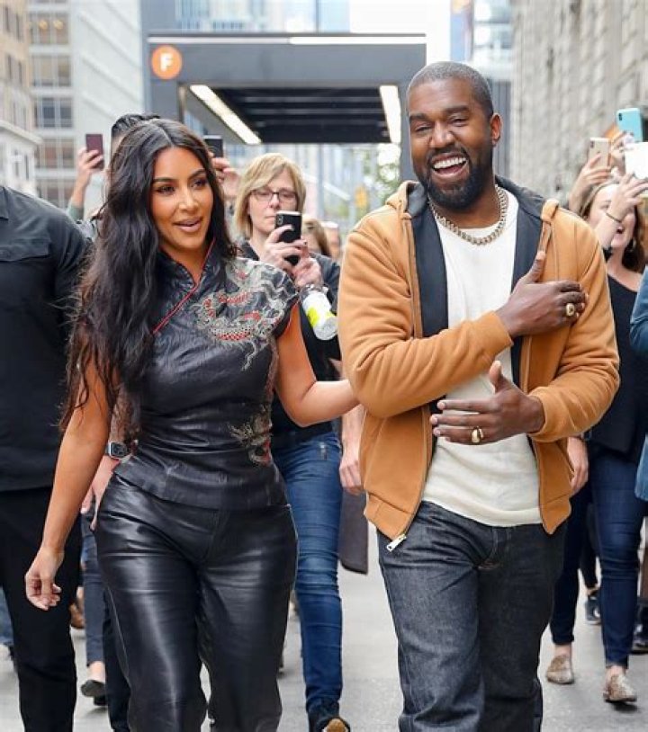 Kim Kardashian & Kanye West Share Steamy Elevator Kiss In Paris & Fans Are Swooning: ‘This Is Everything’